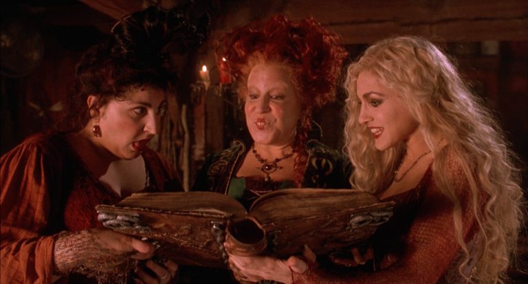 The Sanderson Sisters cast a spell with their living spell book. Hocus Pocus is the Halloween movie of all time.
