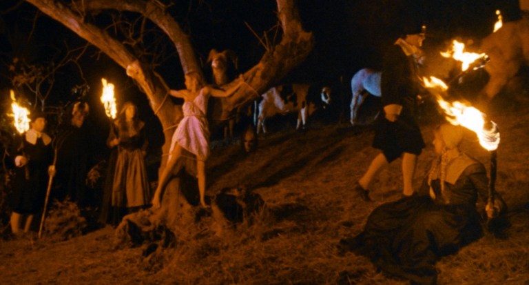 A witch is burned in this 80s film. 