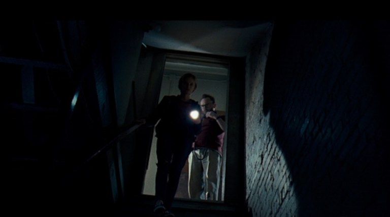 Sara Paxton and Pat Healy in The Innkeepers (2011).