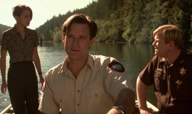 Bridget Fonda, Bill Pullman, and Brendan Gleeson in Lake Placid (1999).
