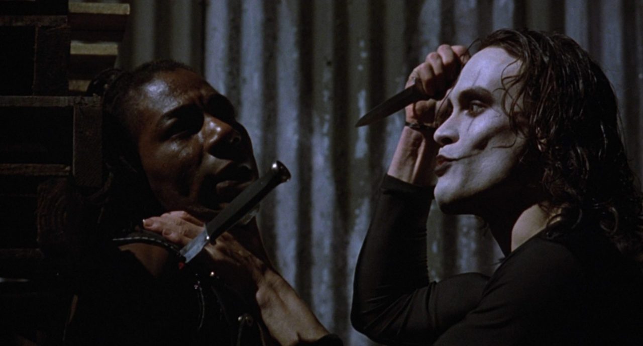 Laurence Mason and Brandon Lee in The Crow (1994).
