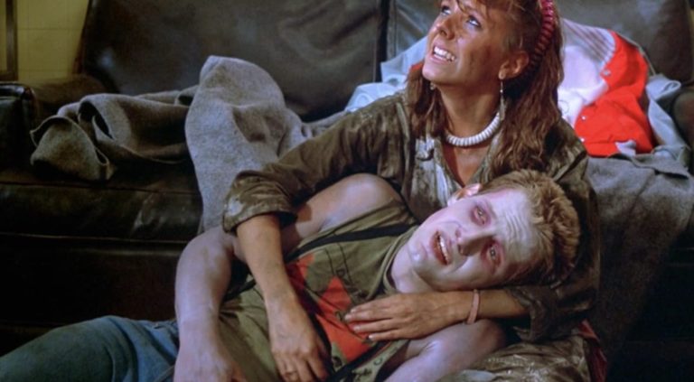 Thom Mathews and Beverly Randolph in The Return of the Living Dead (1985).