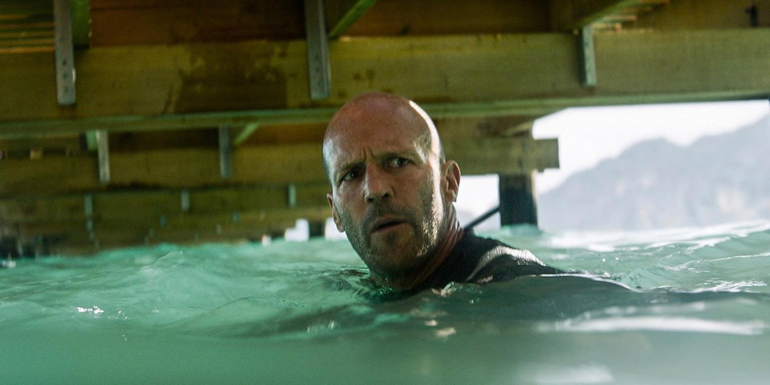 If you like your killer shark movies mindless and fun, bite into “The Meg”