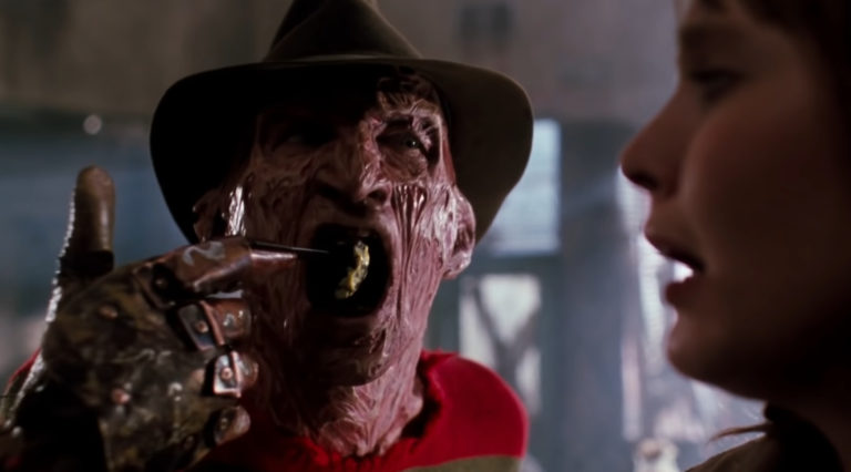 Freddy Krueger (Robert Englund) eats a soul-filled meatball in A Nightmare on Elm Street 4: The Dream Master (1988).