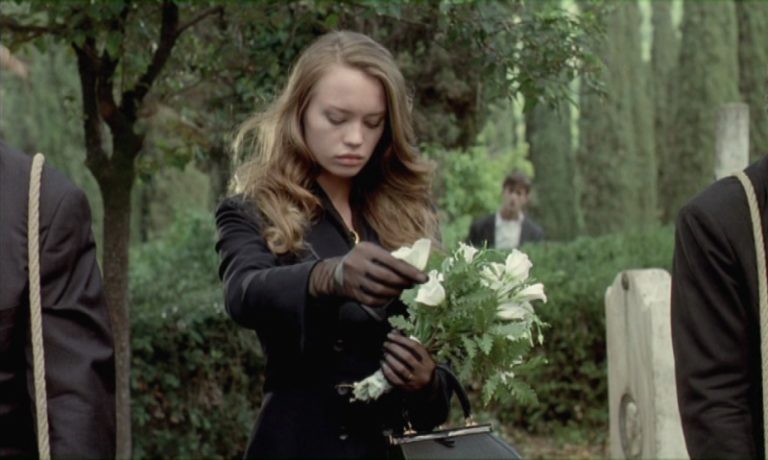 Anna Falchi (with Rupert Everett in th background) in Cemetery Man (1994).