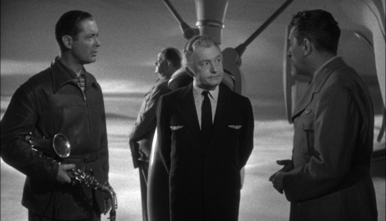Robert Montgomery, Claude Rains, and Edward Everett Horton in Here Comes Mr. Jordan (1941).