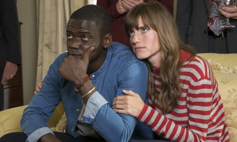 Allison Williams embraces Daniel Kaluuya in Get Out (2017).