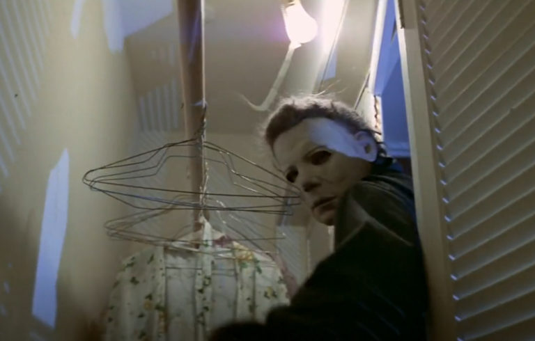The Shape attacks Laurie in the closet in Halloween (1978).