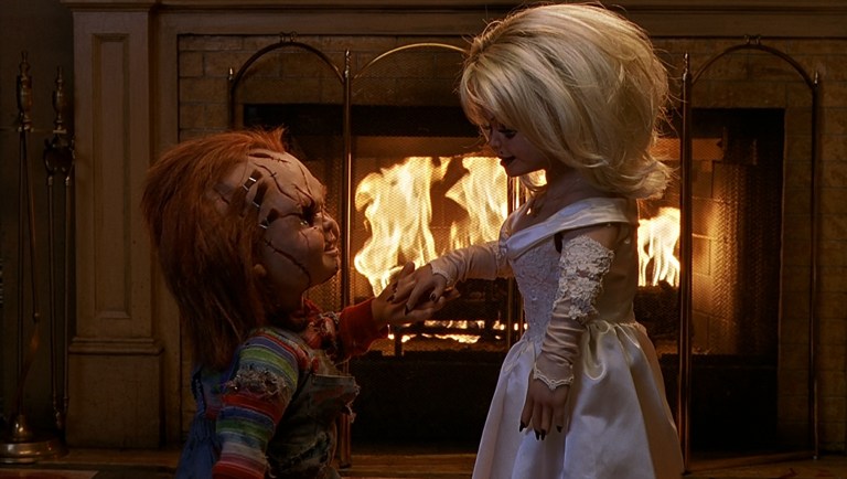 Brad Dourif and Jennifer Tilly as the voices of Chucky and Tiffany in Bride of Chucky (1998).