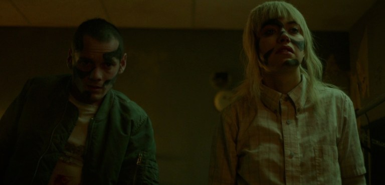 Anton Yelchin and Imogen Poots in Green Room (2015).