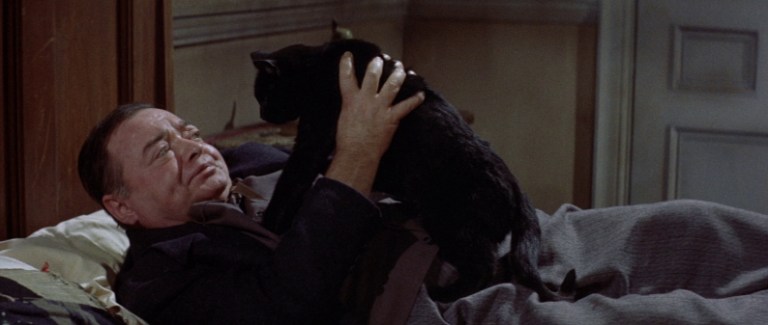 Peter Lorre with a black cat in Tales of Terror (1962).