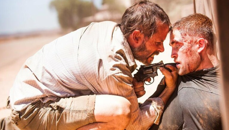 Guy Pearce and Robert Pattinson in The Rover (2014).