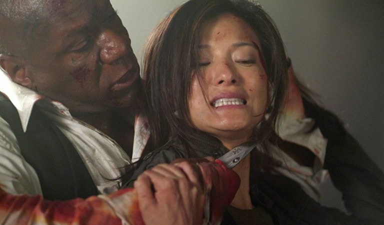 Ving Rhames and Kelly Hu in The Tournament (2009).