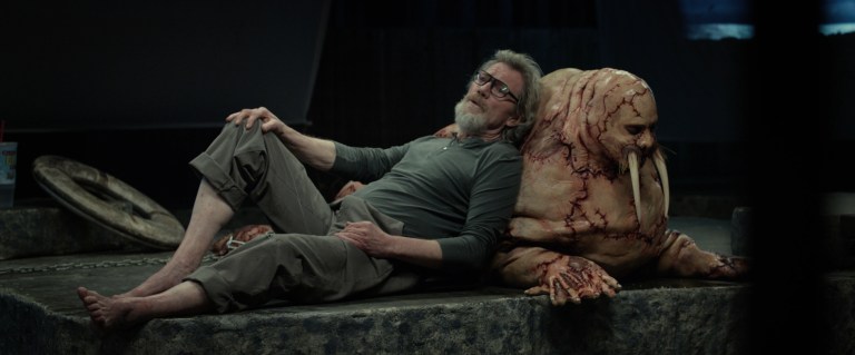 Michael Parks and Justin Long in Tusk (2014).