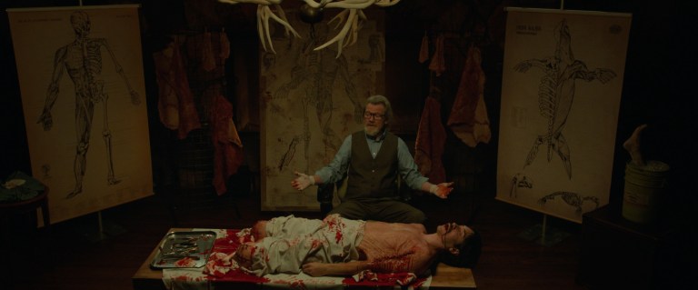 Michael Parks and Justin Long in Tusk (2014).