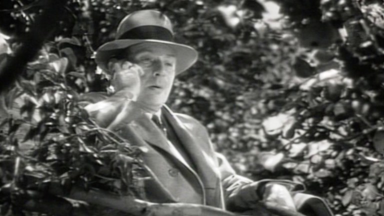 Mr. Brink up a tree in On Borrowed Time (1939).