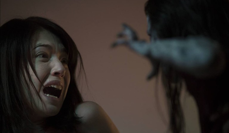 Hsu Wei-Ning (Tiffany Ann Hsu) in The Tag-Along (2015).