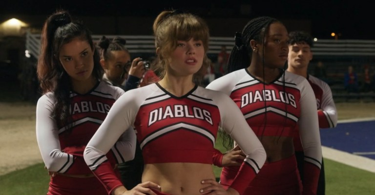 The Diablos cheer squad on the sideline of a football game during Bring It On: Cheer or Die (2022)