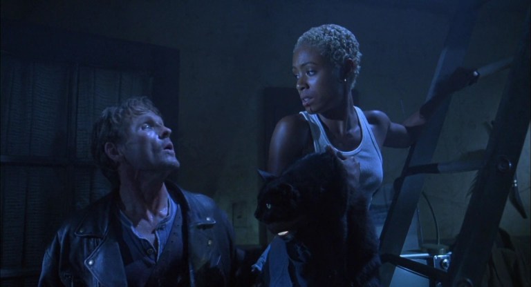 William Sadler and Jada Pinkett Smith in Tales from the Crypt: Demon Knight (1995)