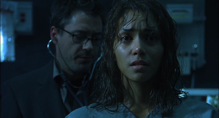 Halle Berry and Robert Downey Jr. in Gothika (2003)