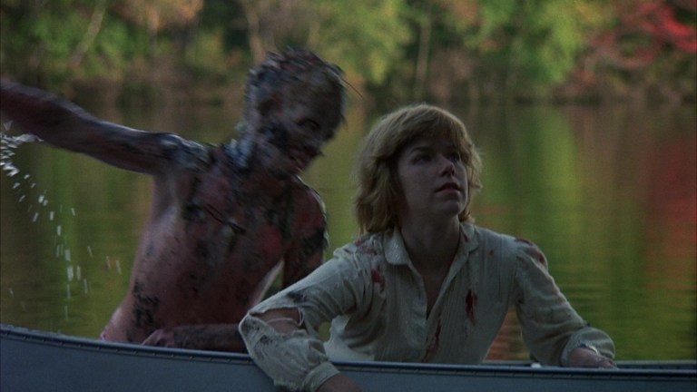 A young Jason leaps out of Camp Crystal Lake to grab Alice (Adrienne King) in the dream sequence ending of Friday the 13th (1980).