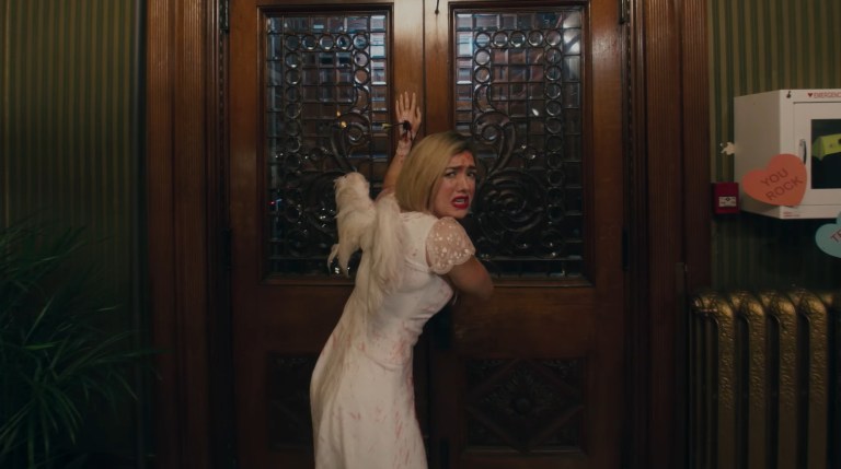 Becca tries to escape in Eli Roth's Be Mine: A VR Valentine's Slasher (2023)