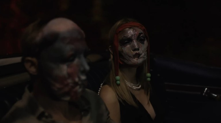 Gabi wears a mask in Infinity Pool (2023).