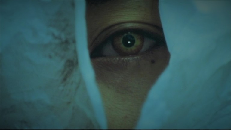 Tomie's eye as seen in Tomie (1998).