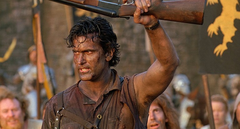 Ash talks to primitive screwheads in Army of Darkness (1992).