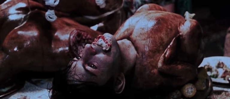 A man's head is stuck on a turkey's body in Eli Roth's fake trailer for Thanksgiving.