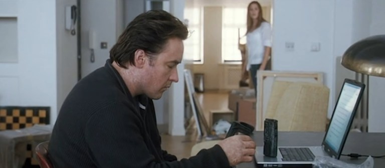 John Cusack plays a tape recorder in 1408 (2007).