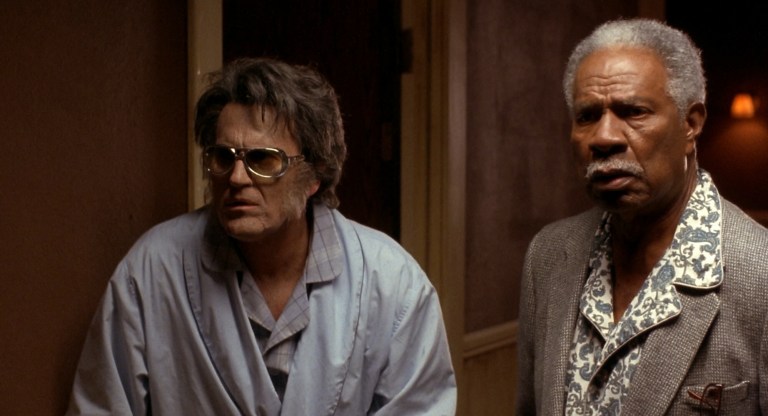 Bruce Campbell as Elvis and Ossie Davis as JFK in Bubba Ho-Tep (2002).