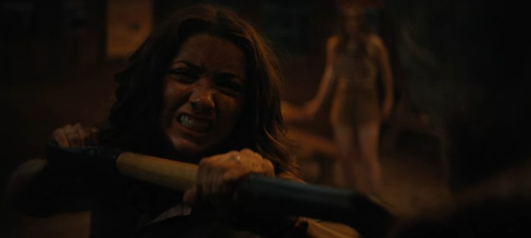 Cindy (Emily Rudd) attacks Tommy in Fear Street Part Two: 1978 (2021).