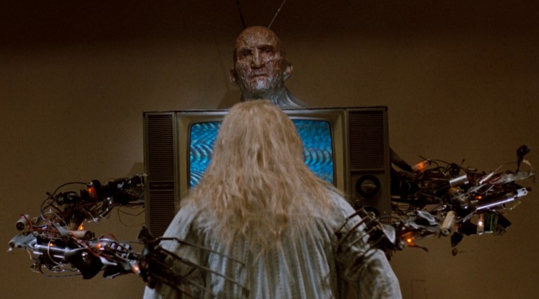 Freddy Krueger emerges from a television in A Nightmare on Elm Street 3: Dream Warriors (1987).