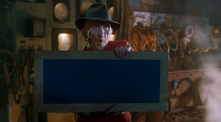 Freddy prepares a chalkboard for Carlos in Freddy's Dead: The Final Nightmare (1991)