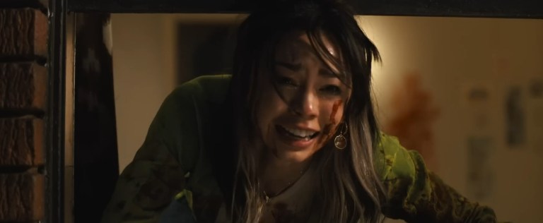 Anika tries to escape Ghostface in Scream VI (2023).