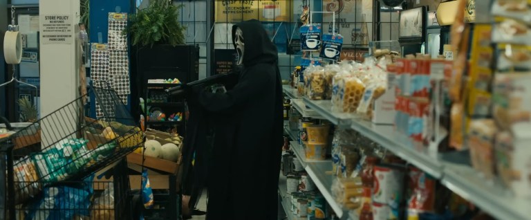 Ghostface hunts Sam and Tara in a New York bodega in Scream VI (2023).