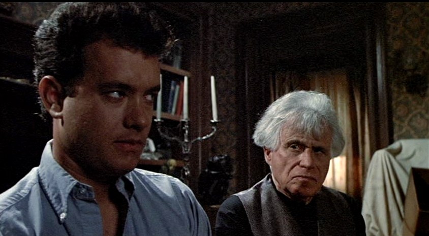 Tom Hanks looks wary in The 'Burbs (1989).