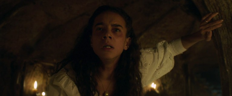 Hannah John-Kamen as Maya in Unwelcome (2022).