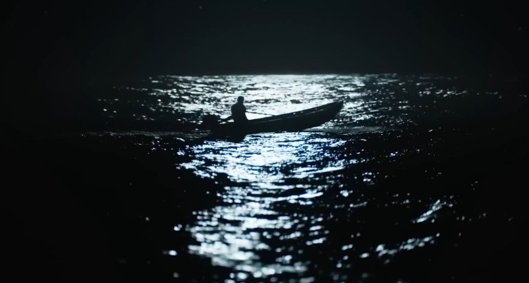 Beau in a motorboat in Beau is Afraid (2023).