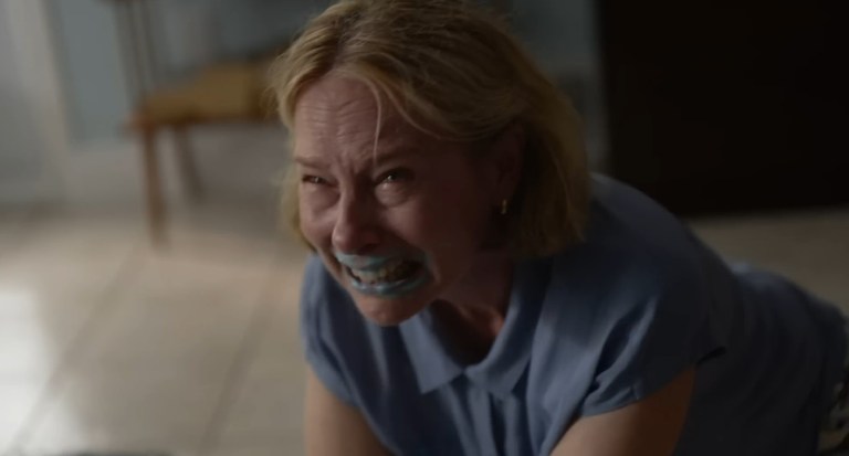 Grace with paint on her face in Beau is Afraid (2023).