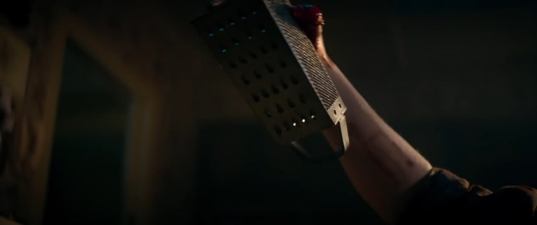 A cheese grater in Evil Dead Rise (2023).