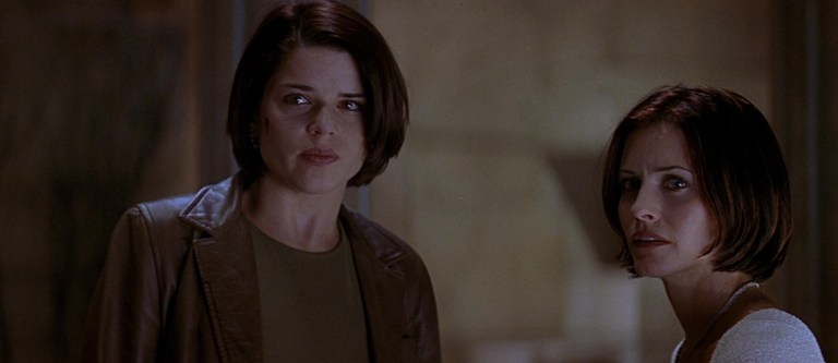 Neve Campbell and Courteney Cox in Scream 2 (1997).
