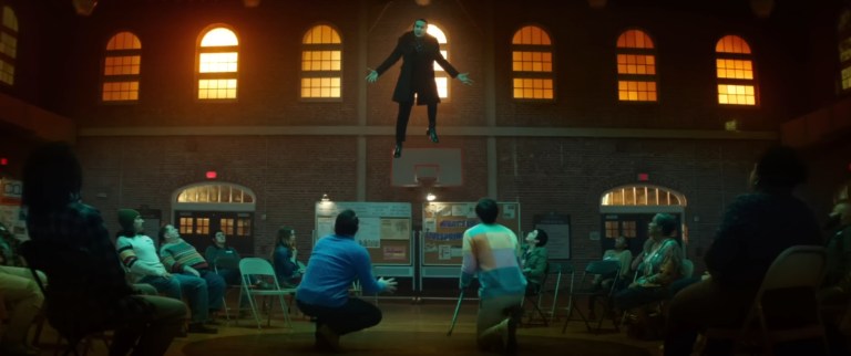Dracula floats in a gym in Renfield (2023).