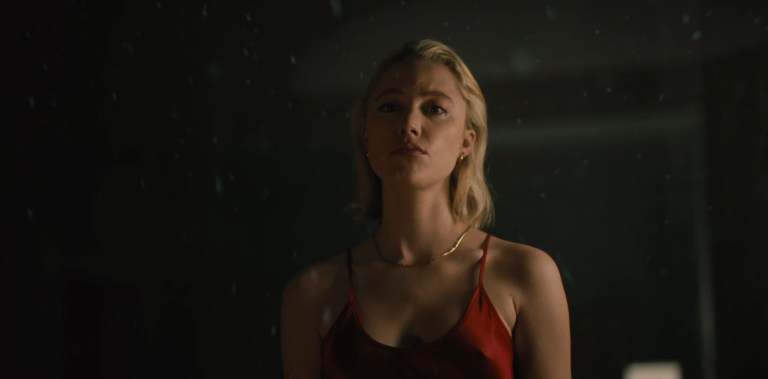 Maika Monroe as Julia in Watcher (2022).