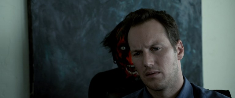 Joseph Bishara and Patrick Wilson in Insidious (2010).