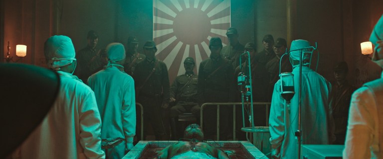 A flashback to a Japanese prison camp experiment in the Philippines during World War II in Project Wolf Hunting (2022).