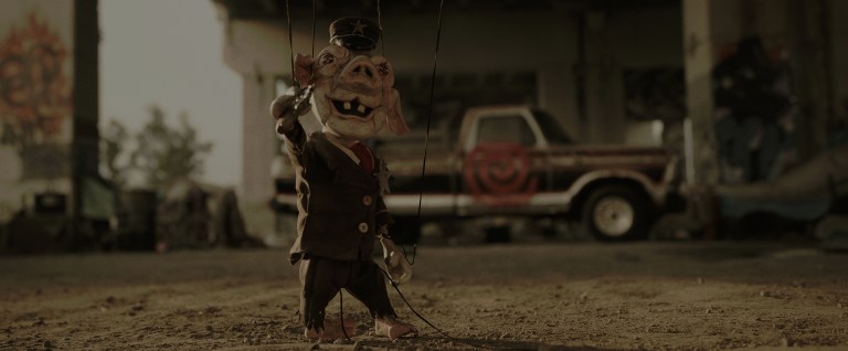 A puppet of a pig police officer in Spiral (2021).