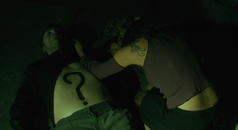 Donnie Greco about to die in Saw (2004).