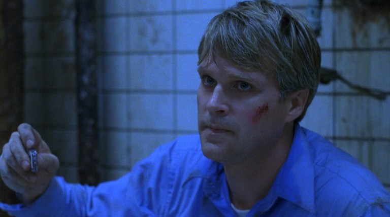 Cary Elwes as Lawrence Gordon in Saw (2004).